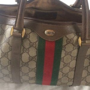 Authentic used Gucci. Zipper broke
